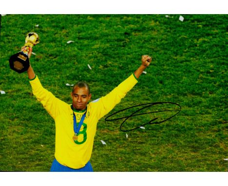 Gilberto Silva signed 12x8 inch colour photo pictured celebrating with the World cup while playing for Brazil. Good condition