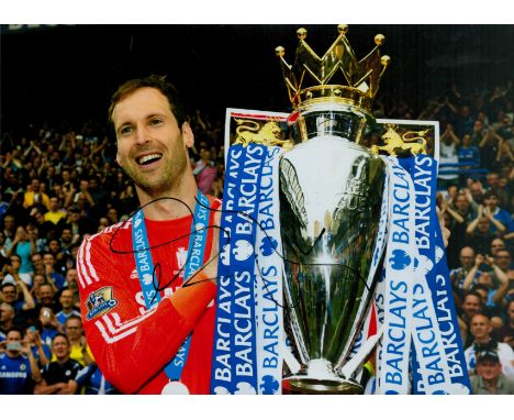 Petr Cech signed 12x8 inch colour photo pictured with the Premier League trophy during his playing days with Chelsea. Good co