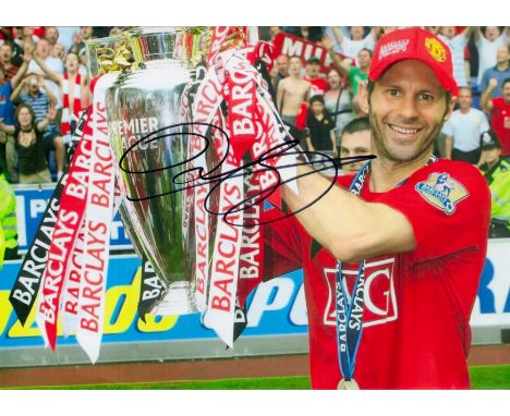 Ryan Giggs signed 12x8 inch colour photo pictured celebrating with the Premier League trophy during his playing days with Man