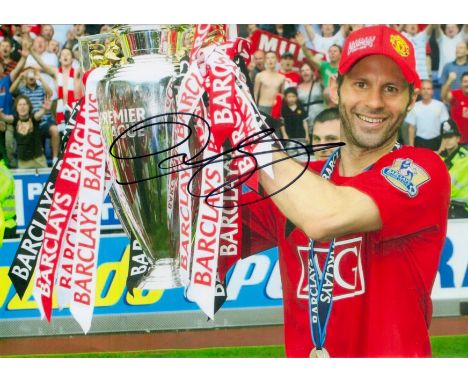 Ryan Giggs signed 12x8 inch colour photo pictured celebrating with the Premier League trophy during his playing days with Man