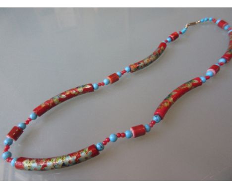 Turquoise coral and enamel decorated porcelain necklet