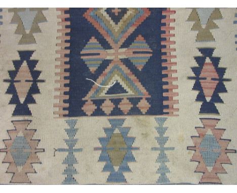 Small Kelim rug with all-over geometric design on an ivory ground