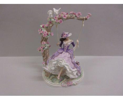 Large modern Royal Worcester figure of a girl on a swing entitled ' Summer's Dream '