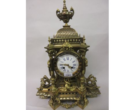 Large 19th Century French gilt brass mantel clock of ornate pagoda design with an urn surmount above fluted columns, entwined