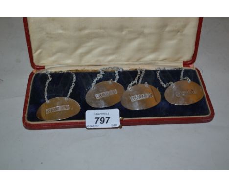 Cased set of four early 20th Century London silver decanter labels by Samson Mordan & Company