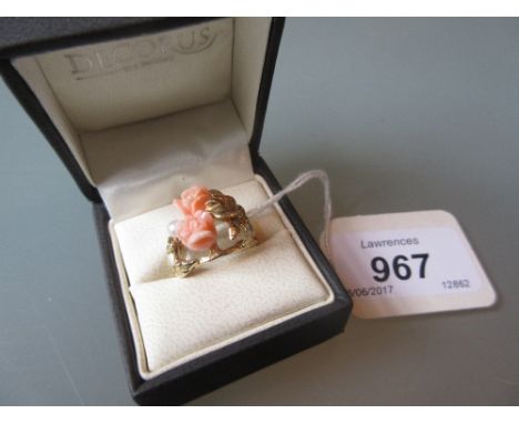 14ct Yellow gold flowerhead ring set carved coral and a cultured pearl