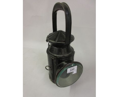 Early 20th Century black Japanned railway lamp with original oil well