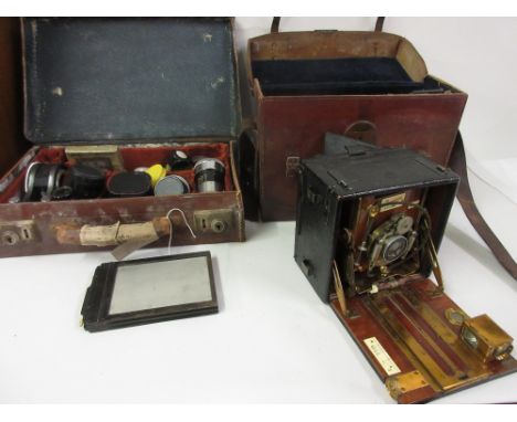 Sanderson leather cased plate camera with accessories and slides, together with a leather case containing a quantity of vario