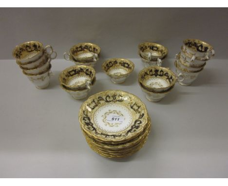 19th Century English porcelain tea and coffee service with blue and gilded borders (some damages)