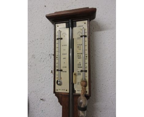 19th Century oak stick barometer, the ivory scale with single adjustable vernier, signed R. Webster, Londn, the exposed mercu