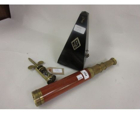 19th Century mahogany and brass mounted four section telescope, a brass corkscrew and a metronome
