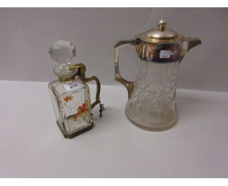 Cut glass lemonade jug with plated mounts together with a 19th Century enamelled glass decanter with gilt brass locking mecha