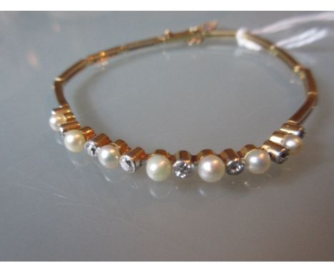 18ct Yellow and white gold pearl and old cut diamond bracelet