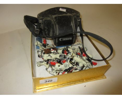 Quantity of miscellaneous items including a set of play worn Britains toy soldiers on horseback, Canon camera, a book 'Histor