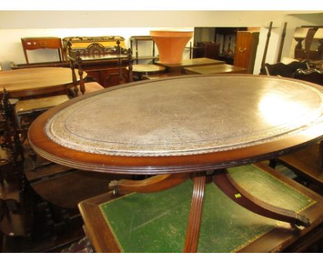 Reproduction mahogany oval coffee table with a leather inset top, a reproduction mahogany two drawer side table and two wine 