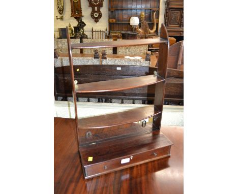 19th Century mahogany three shelf wall bracket with box base