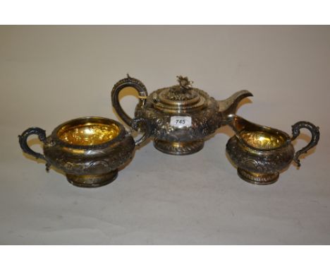 William IV silver three piece tea service of circular squat floral embossed design, London 1830 / '34