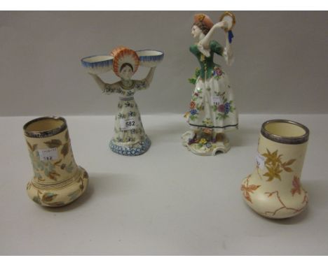 Samson Chelsea figure of a girl playing a tambourine, a Faience figural salt and a pair of silver mounted floral decorated va