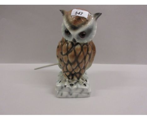 German porcelain table lamp modelled in the form of an owl and a similar vase