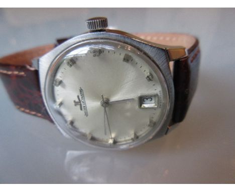 Jaeger LeCoultre, gentleman's stainless steel wristwatch with silvered dial and calendar, on a brown leather strap