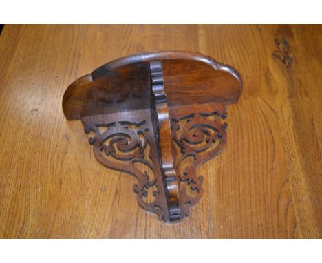 Small Victorian walnut and fretwork wall bracket together with a miniature rosewood box with sliding lid