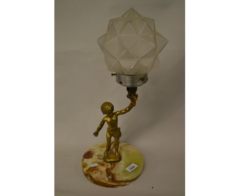 Brass figural lamp base in the form of a boy on circular onyx base with glass shade