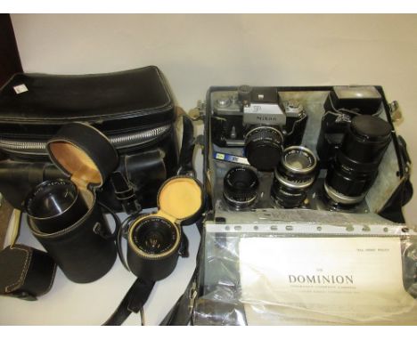 Nikon F camera outfit including four Nikkor lenses and other accessories, camera serial number 6889562