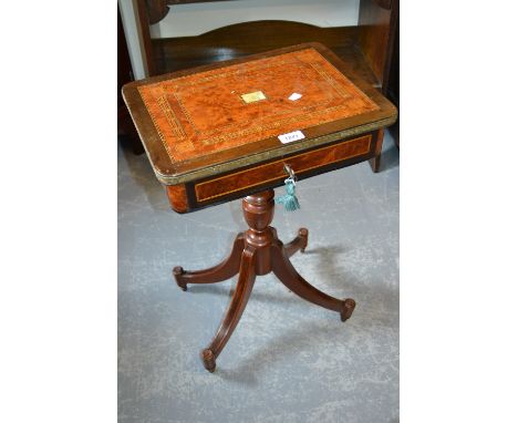 19th Century French parquetry and mother of pearl inlaid work table having hinged top raised on turned single column with swe