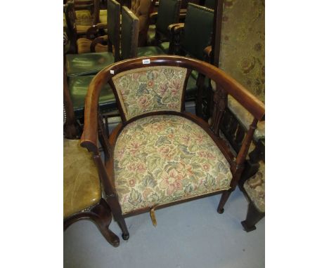 Edwardian beechwood tub shaped drawing room chair with floral upholstery on tapering supports with pad feet together with two