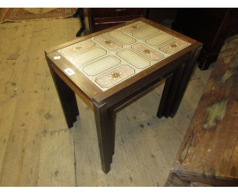 Nest of three mid 20th Century Danish rectangular coffee tables with tile inset tops