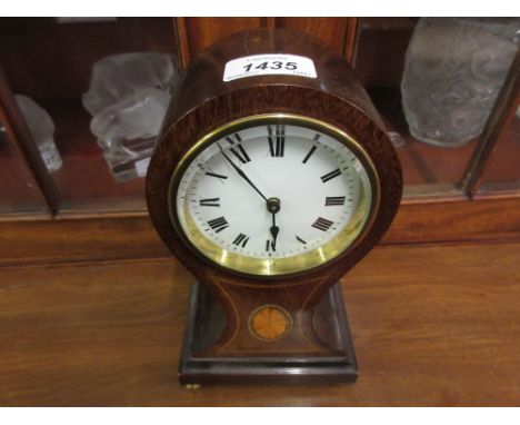 Edwardian mahogany line and lunette inlaid balloon shaped mantel clock with an enamel dial, Roman numerals and brass ball fee