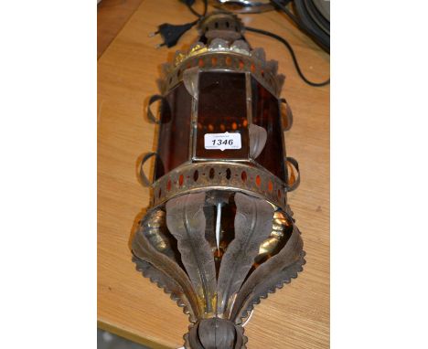 Modern metal wall light with orange glass shades, wooden and chrome lamp base, opaque and green glass ceiling light and a red