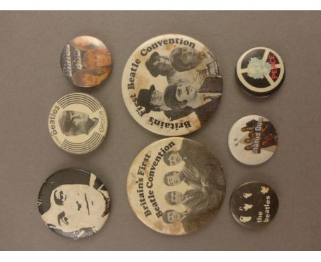 Seven vintage and original music pin and button badges including the Beatles x 5 and Status Quo x 2