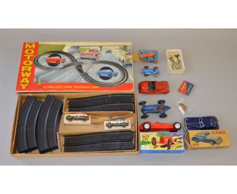 A Marx Motorway set GB, together with a Gama 100 G in F box, a Schylling rubber band racecar, a Schuco 4001 coupe, a Schuco M