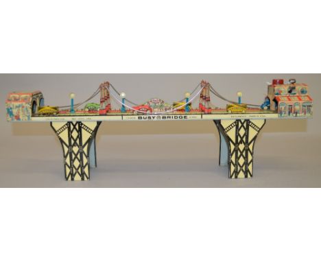 Rare Louis Marx  'Busy Bridge' tin-plate clockwork toy. USA made. G+ condition (minor scratches to decoration. Approx 24" len