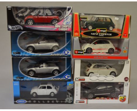 Eight 1:18 diecast model vehicles including: Welly 1957 Fiat Nuova 500; Burago 500 Abarth 2008; 2x Mondo Motors Fiat/Abarth; 
