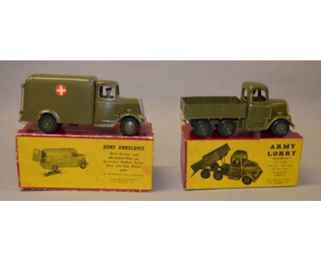 Two Britains vehicles including: No.1335 Army Lorry (with driver); No.1512 Army Ambulance (with driver and wounded man on str
