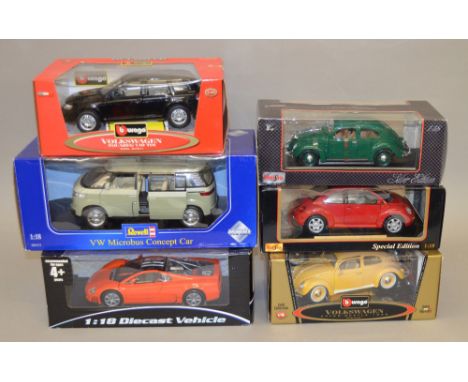 Six 1:18 scale diecast model vehicles including: Revell VW Microbus Concept Car; 2x Maisto Volkswagon New Beetle/ Volkswagon 