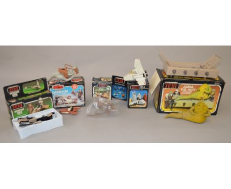 Quantity of boxed Star Wars vehicles and playsets including RoTJ Jabba The Hut; RoTJ Speeder Bike and an unboxed Kenner small