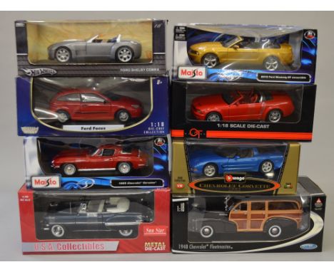 Eight assorted 1:18 scale diecast model vehicles including: Maisto 2010 Ford Mustang GT Convertible; Ford Mustang; Motor Max 