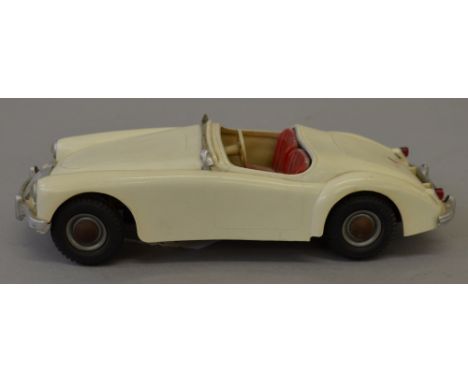 Victory Industries 1/18 scale MG model: cream with red interior, black rubber wheels. Lacks windscreen, unboxed.