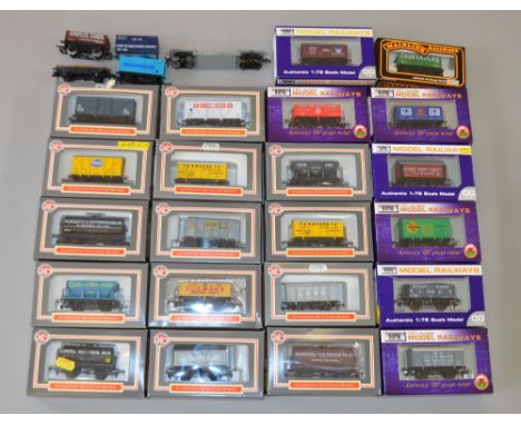 OO Gauge, Dapol & Mainline boxed rolling stock. Includes hopper wagons, mineral wagons, box vans etc. Together with 4 x items