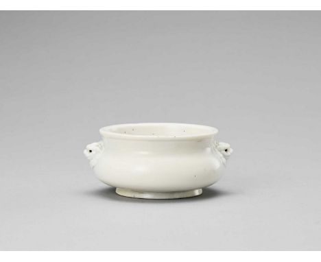   A DEHUA PORCELAIN CENSER, KANGXI  China, 1661-1722. The blanc-de-chine incense burner has a compressed body with curved sid