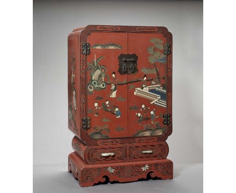   AN IMPRESSIVE LACQUERED WOOD CURIO CABINET, LATE QING  China, late Qing dynasty (1644-1912). Beautifully lacquered in red a