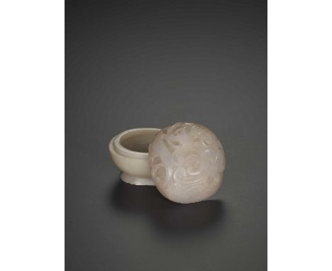   A SMALL JADE CHILONG BOX, QING  China, late 19th - early 20th century. The stone of opaque, creamy white color with a few r