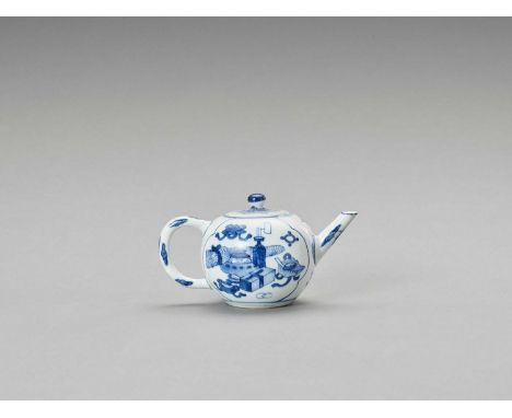   A BLUE AND WHITE PORCELAIN TEAPOT  China, 19th century. The globular Kangxi style teapot with slender handle and straight s
