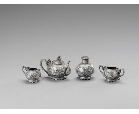   AN EXPORT SILVER TEA SERVIC, C. 1900  China, c. 1900. Consisting of a lidded teapot, a lidded caddy, a milk jug and a sugar