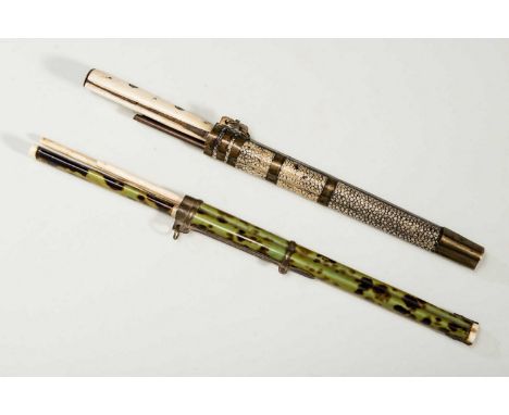   TRAVEL CUTLERY  China, late Qing dynasty to Republican era, 19th - 20th cent. Quiver with a knife, two chopsticks, and toot