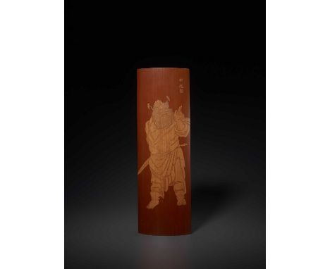   A BAMBOO WRIST REST, QING  China, 19th - early 20th century. Expressive depiction of Zhong Kui in light relief. Artist seal
