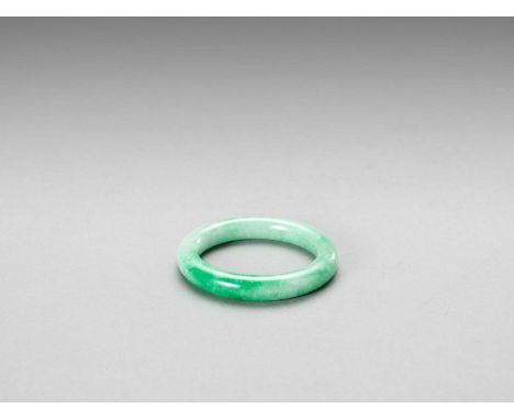   A JADEITE BANGLE, LATE QING TO REPUBLIC  China, late Qing dynasty (1644-1912) to Republic period (1912-1949).    Condition: